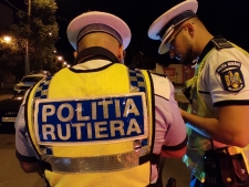 Patru polițiști de la Rutieră și examinatori auto din Brașov, reținuți pentru corupție
