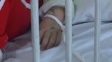 Bacău: Un copil a fost LEGAT cu un ham de pat
