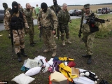 ȘOCANT. JAF cu focuri de armă la locul tragediei din Ucraina